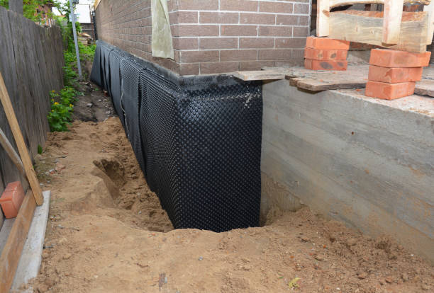 Happy homeowners after waterproofing job in Netcong